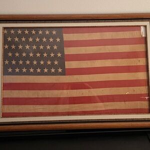 48 Star WWI era American Flag. Framed and mounted in a solid oak frame.
